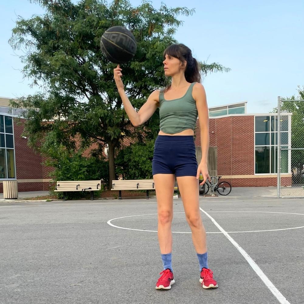 Rozzebud coaching basketball outdoors in Ottawa